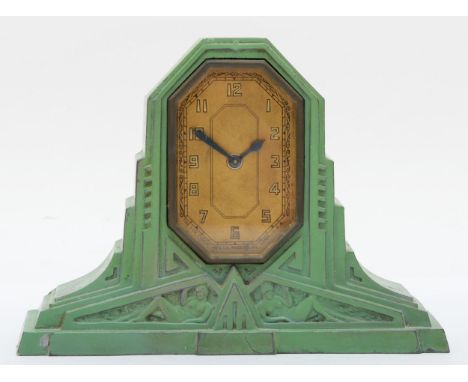 The Lux Clock Co., USA, an unusual Art Deco pale green painted mantel clock with Savings Bank to the back, ht 14cm. 