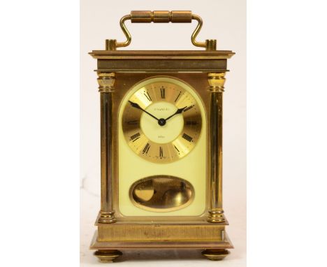 A 1980s West German carriage clock, retailed by H. Samuel, the eight day movement striking on a bell, 18cm high. 