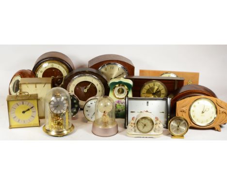 A collection of mid 20th century and later mantel clocks, having manual and quartz movements, in three boxes. (3) 