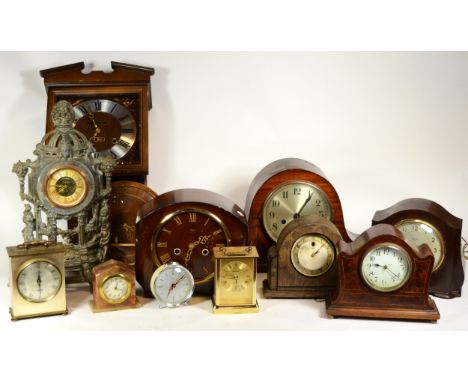 A collection of mid 20th century and later mantel clocks, having manual and quartz movements, in three boxes. (3) 