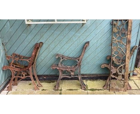 Three pairs of cast metal garden bench ends. (3) 
