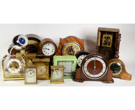 A collection of mid 20th century and later mantel clocks, having manual and quartz movements, in three boxes. (3) 