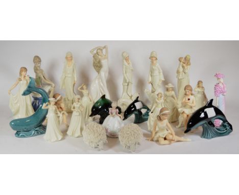 A group of ceramic figurines to include Poole pottery, and a Coalport David Shilling 'Night at the Opera' lady. 