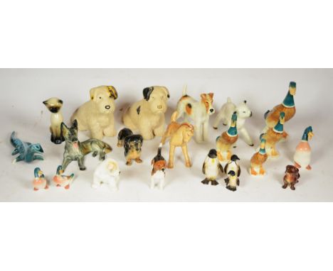 A collection of pottery animal models, makers to include Sylvac, Beswick and Goebel. 