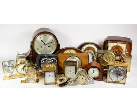 A collection of mid 20th century and later mantel clocks, having manual and quartz movements, in four boxes. (4) 