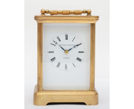 Matthew Norman, an English brass striking carriage clock, the signed movement striking the half and hours on a gong, 14.5cm 