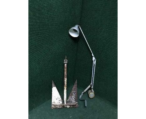 An angle poised lamp and an anchor 