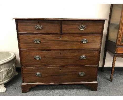 A Georgian mahogany five drawer chest on bracket feet