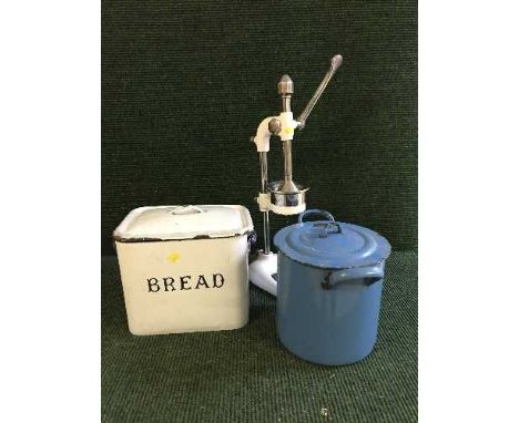 An enamel bread bin, flour bin and fruit juicer