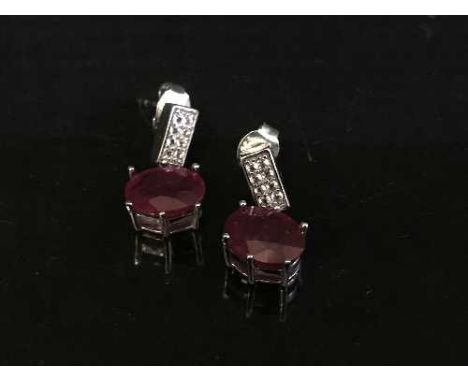 A pair of silver and African ruby drop earrings