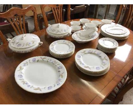 A quantity of Royal Worcester Blue Poppy dinner ware