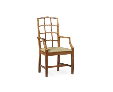  PETER WAALS (DUTCH 1870-1937), AFTER DESIGNS BY ERNEST GIMSON (BRITISH 1864-1919) ARTS & CRAFTS ARMCHAIR, CIRCA 1930 walnut,