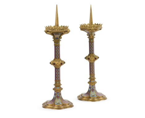  FRENCH GOTHIC REVIVAL PAIR OF PRICKET CANDLESTICKS, CIRCA 1860 the drip trays impressed 374, brass, blue, red, green and whi
