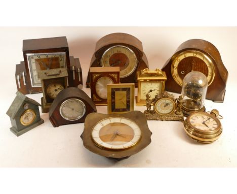 A collection of mid 20th century and later mantel clocks, wall clocks and barometers, having manual and quartz movements. (3)