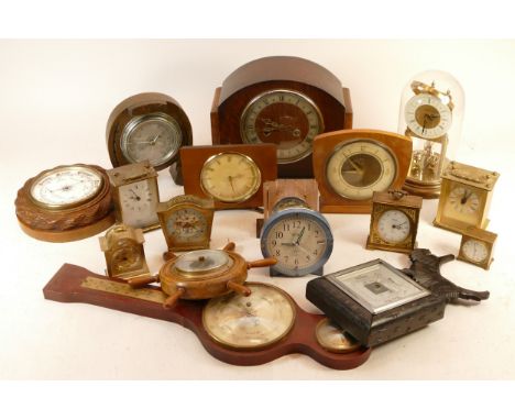 A collection of mid 20th century and later mantel clocks, wall clocks and barometers, having manual and quartz movements. (3)