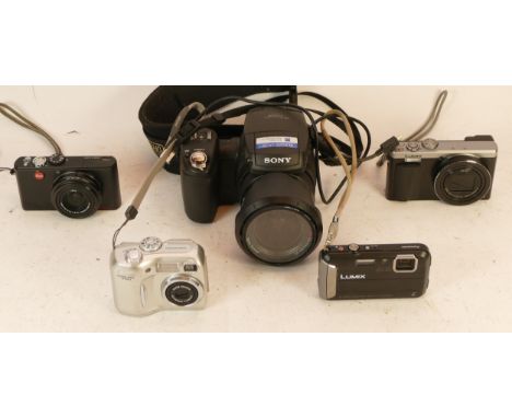 A collection of digital cameras to include a Leica D-Lux 3, a Sony DSC-R1 and a Lumix DMC-TZ80