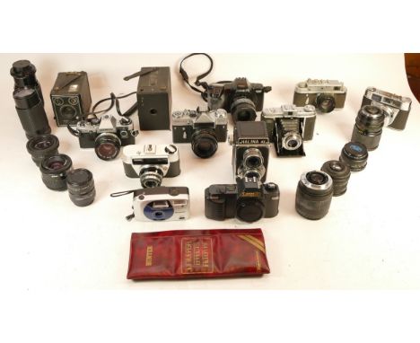 A collection of mixed cameras and accessories to include an Olympus OM10, a Kodak Six-20 Brownie and a Korki 4K 