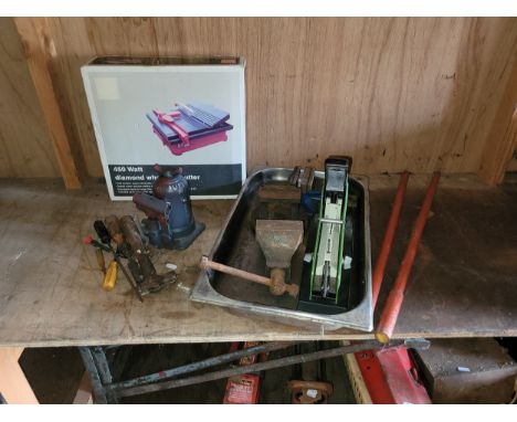 Diamond wheeled tile cutter, hand jack, large stapler, also 2 x Record bench vice. 