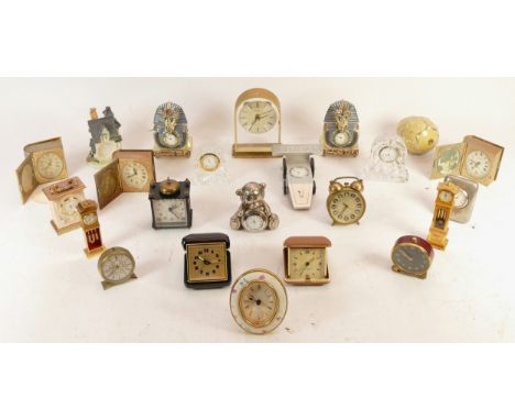 A collection of 20th century and later miniature novelty and traveling clocks, having manual and quartz movements. (3) 