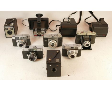 A collection of mixed cameras to include a Kodak Retinette 1A, several box cameras and a Polaroid