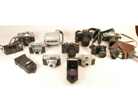 A collection of mixed cameras and accessories to include a Yashica U-Matic, a Zenit EM and a Minolta X300 
