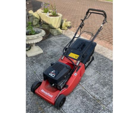 A Mountfield XTE40 petrol driven lawn mower, having Briggs &amp; Stratton engine. 