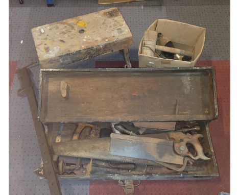 An early 20th century carpenters tool box and contents to include various hand tools, together with a pine stool. 