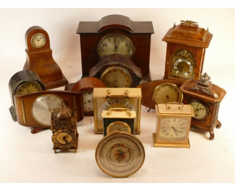 A collection of mid 20th century and later mantel clocks, wall clocks and barometers, having manual and quartz movements. (3)