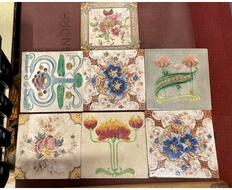 Seven Victorian and Art Nouvelle ceramic tiles, 15x15cm. (7) 