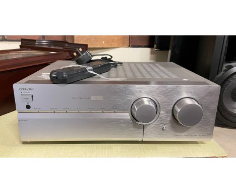 A Sony stereo amplifier, model TA-FB940R, with remote. 