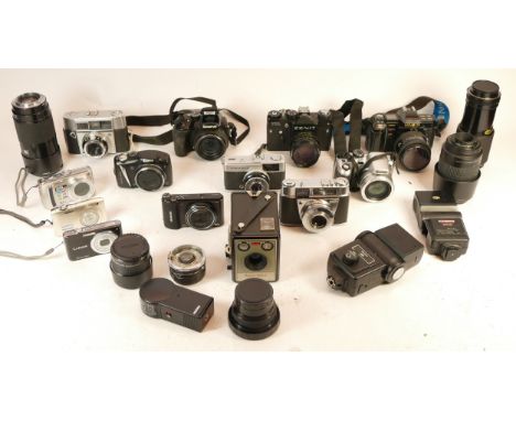 A collection of mixed cameras and accessories to include a Minolta 7000, a Zenit TTL and vintage box cameras 