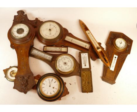 A collection of early 20th century and later wall barometers, to include a Hay Marc of Paris combination clock/barometer and 