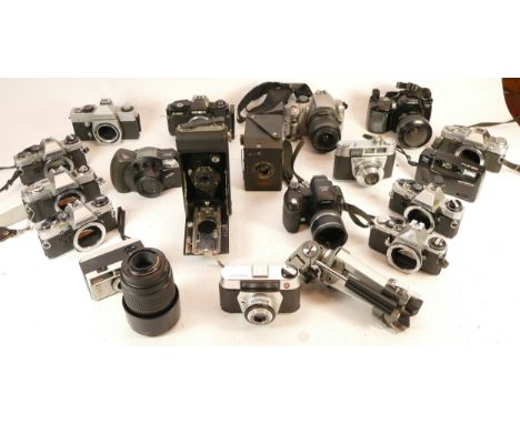 A collection of mixed cameras and accessories to include a Minolta X300, an Olympus OM10 and an Olympus OM30 
