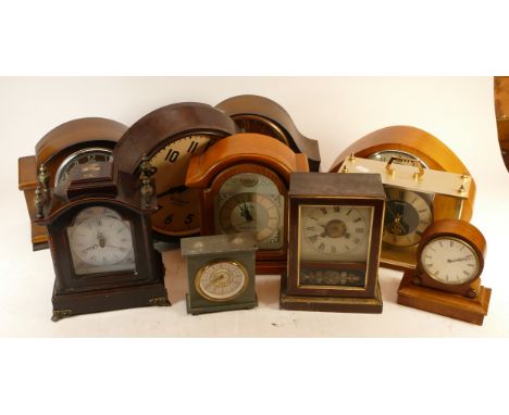 A collection of mid 20th century and later mantel clocks, wall clocks and barometers, having manual and quartz movements. (3)