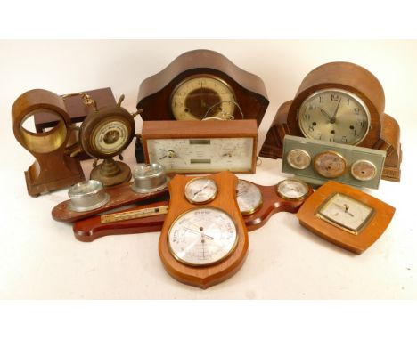 A collection of mid 20th century and later mantel clocks, wall clocks and barometers, having manual and quartz movements. (4)