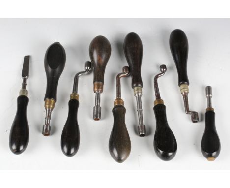 A collection of various 19th century gun tools, comprising eight nipple wrenches and a single turnscrew screwdriver, all with