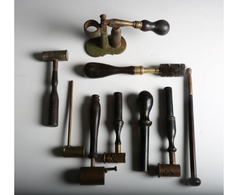 A small collection of mid to late 19th century shooting tools and accessories, including a 10-bore breach-cleaning brush by W