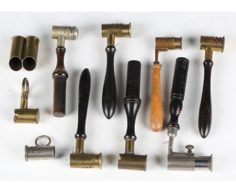A collection of various 19th century shot and powder measures, including an example by G. &amp; J.W. Hawksley with turned rhi