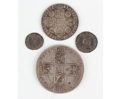 A George II Lima half-crown 1746, a George II shilling 1741, reverse with roses to the angles of the shields, a George II two