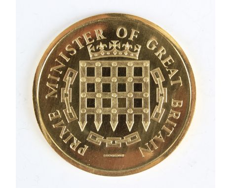 A Medallioners Limited 22ct gold medallion commemorating Sir Winston Churchill, obverse with head portrait and legend 'Winsto