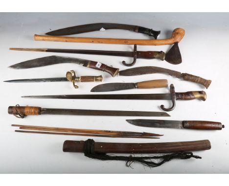 A collection of various edged and other small weapons, including a Bowie style knife with clipped-point blade, blade length 1