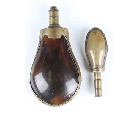 An 18th century brass mounted turtle shell powder flask with moulded decorated frame and cylindrical nozzle, length 16cm, tog