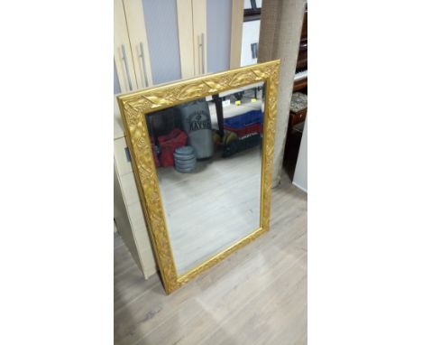 LARGE BEVELLED MIRROR IN ORNATE FRAME  