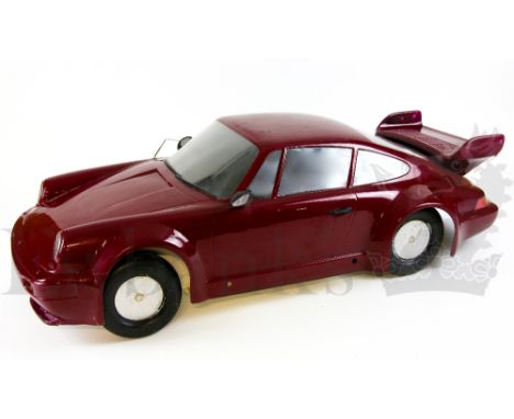 † Con Air (1997) A large scale miniature of a Porsche 911 constructed of plastic and other materials. Utilised in the action 