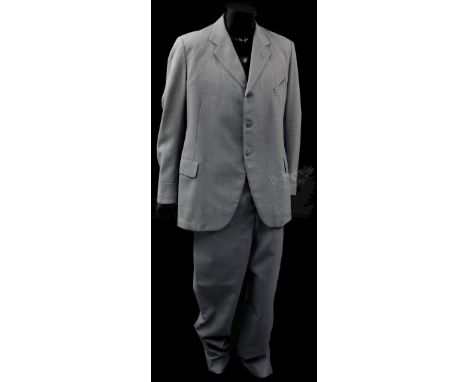 † The Benny Hill Show (1969 -1989) A two piece grey suit made for Benny Hill circa 1970's on the show, retaining interior cos