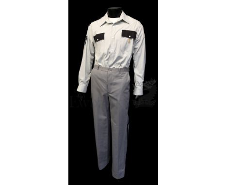 † X-Men 2 (2003) 'Mitchell Laurio' (Ty Olsson), Prison Guard Uniform. Laurio is the head guard in charge of Magneto in his pl