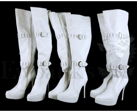 † Goal 3 (2009) Three pairs of white high heel, knee high boots worn by the glamour girl's during the erotic video shoot sequ