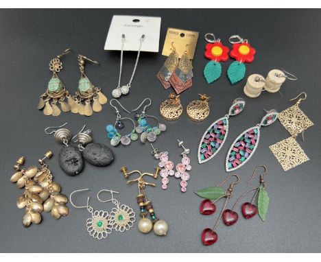 15 pairs of drop style vintage and modern costume jewellery earrings. To include novelty, stone set and ethnic design. 