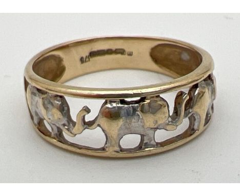 A 9ct white and yellow gold pierced work elephant band ring. Full hallmarks to inside of band. Size N. Total weight approx. 2