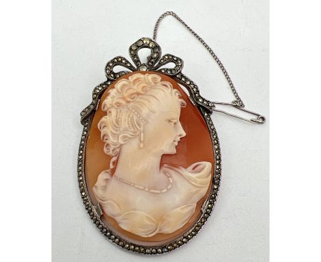 A large vintage 'Habille' cameo brooch of a fine lady, in a marcasite set silver mount. Complete with safety chain &amp; pin.